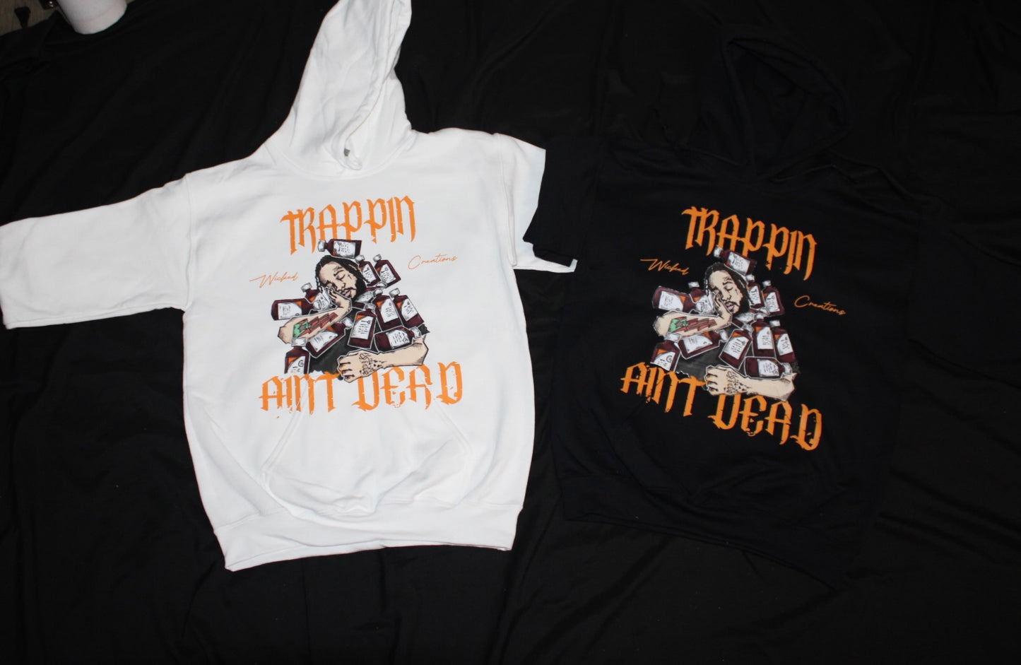 "Trappin Aint Dead" hoodies